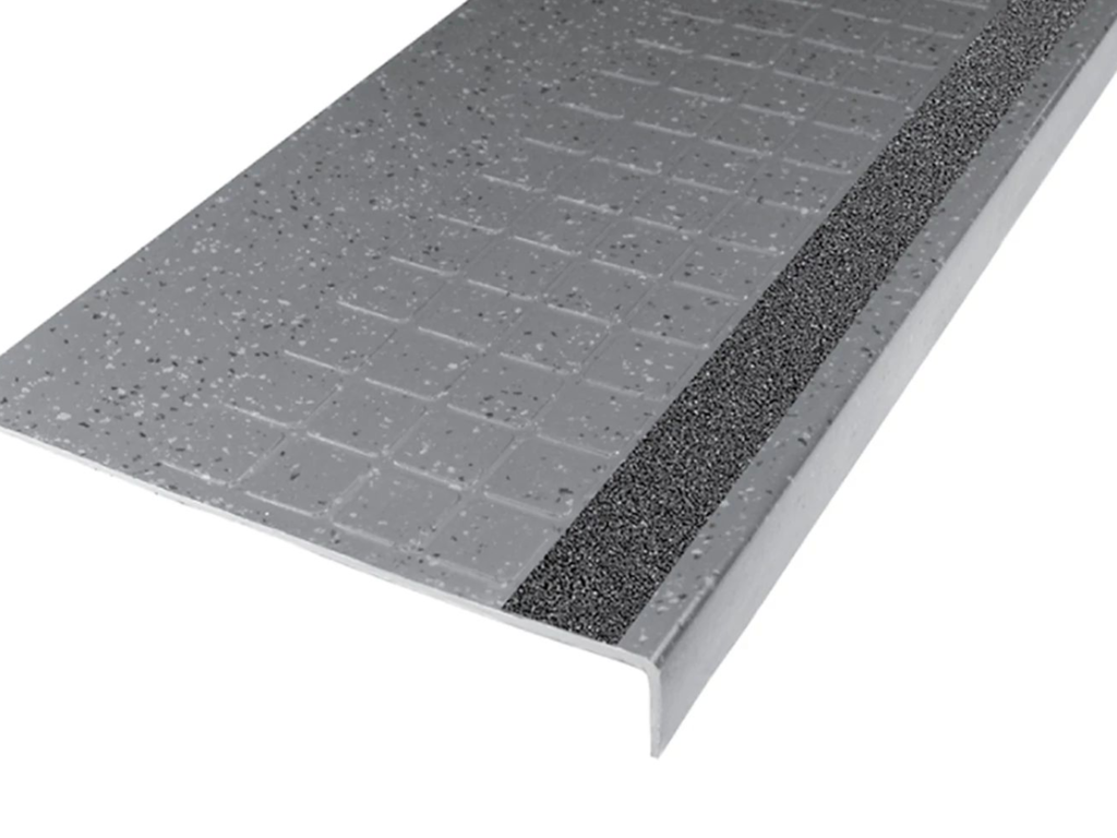 Community Suburban Speckled Stair Tread with Round Profile and Visually Impaired Strip